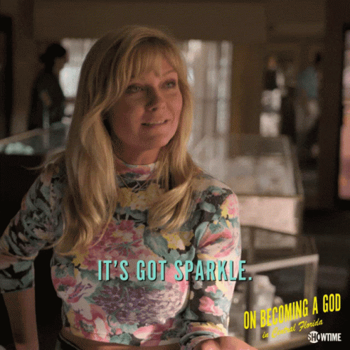 A Woman In A Floral Shirt Says It 'S Got Sparkle On Becoming A God In Central Florida GIF
