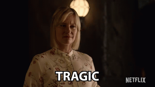 A Woman In A Floral Shirt Says Tragic In A Netflix Advertisement GIF