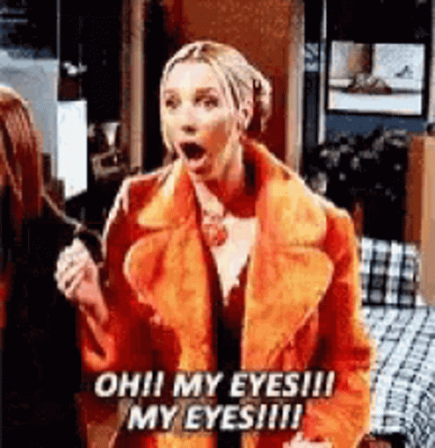 A Woman In A Fur Coat Is Standing In A Room With Her Mouth Open And Says `` Oh ! My Eyes ! '' GIF