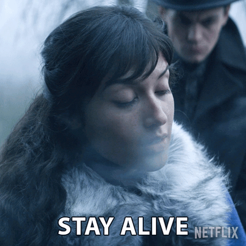 A Woman In A Fur Coat Says " Stay Alive " In A Netflix Ad GIF