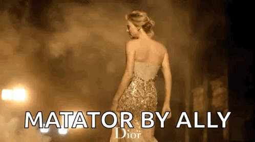 A Woman In A Gold Dress Is Standing In Front Of A Dark Background . GIF