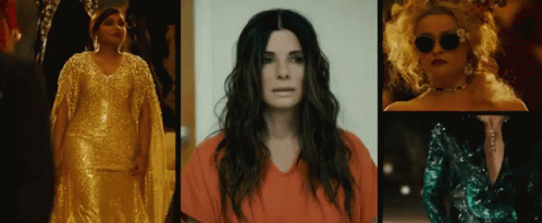 A Woman In A Gold Dress Is Standing Next To A Woman In A Red Shirt GIF