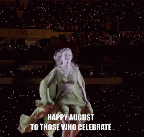 A Woman In A Green Dress Is Dancing With The Words Happy August To Those Who Celebrate GIF