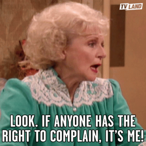 A Woman In A Green Dress Is Saying Look If Anyone Has The Right To Complain It 'S Me GIF