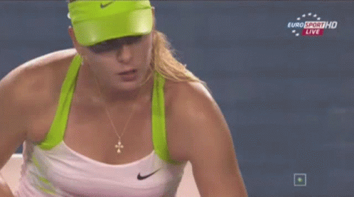 A Woman In A Green Hat And White Tank Top Is On Euro Sport Hd Live GIF
