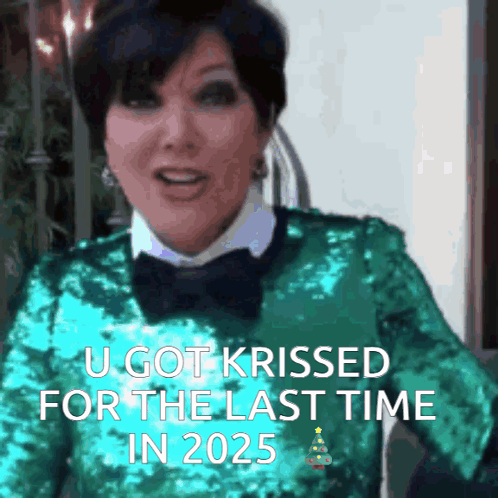 A Woman In A Green Sequined Sweater And Bow Tie Says " U Got Krissed For The Last Time In 2025 " GIF