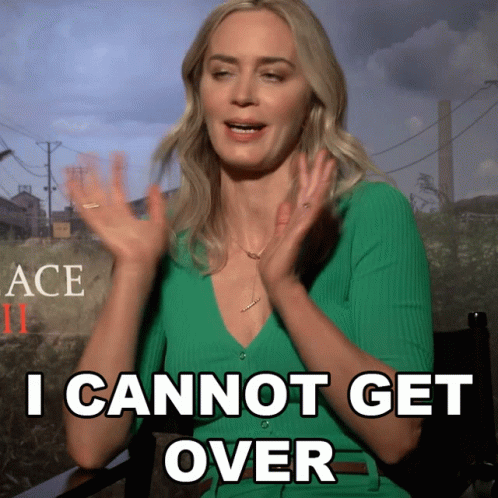 A Woman In A Green Shirt Says " I Cannot Get Over " With Her Hands In The Air GIF