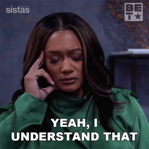 A Woman In A Green Shirt Says " Yeah , I Understand That " GIF