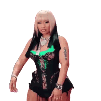 a woman in a green top and black corset is making a funny face