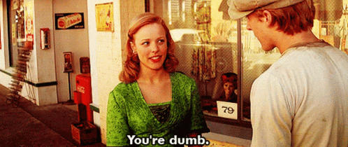 A Woman In A Green Top Says You 'Re Dumb While Talking To A Man GIF