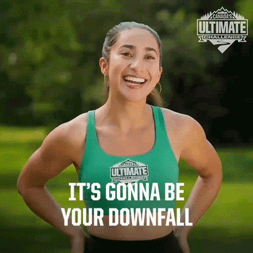 a woman in a green ultimate challenge tank top