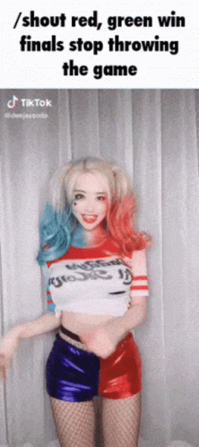 A Woman In A Harley Quinn Costume Is Throwing A Game GIF