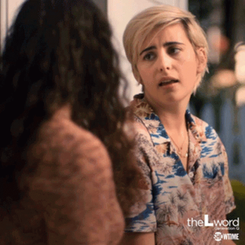 A Woman In A Hawaiian Shirt Is Talking To Another Woman In A Showtime Advertisement GIF