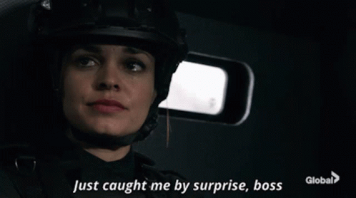 A Woman In A Helmet Is Saying Just Caught Me By Surprise Boss GIF