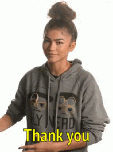 A Woman In A Hoodie Is Giving A Thumbs Up And Saying `` Thank You '' . GIF