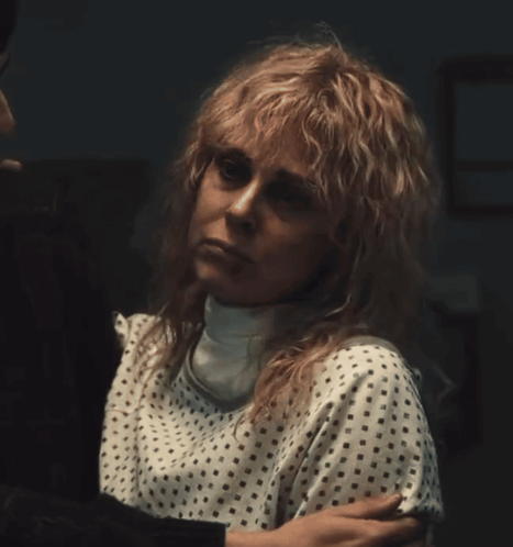 A Woman In A Hospital Gown With The Words " And Did " Written Above Her GIF