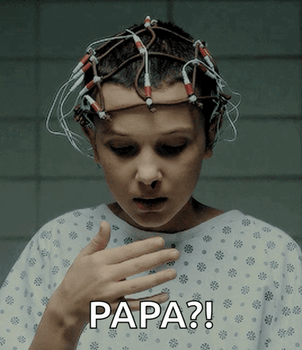 A Woman In A Hospital Gown With Wires On Her Head Says Papa GIF