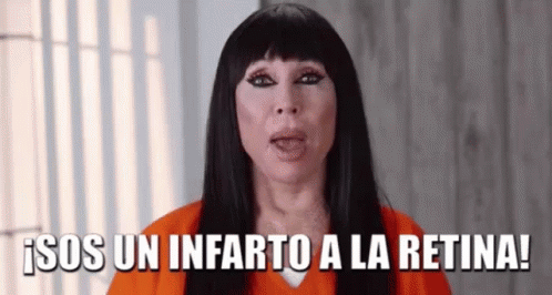 A Woman In A Jail Cell Is Making A Funny Face And Says `` Sos Un Infarto A La Retina ! '' GIF