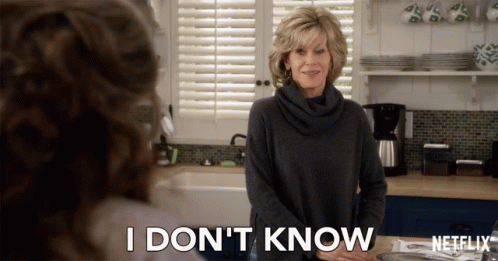 A Woman In A Kitchen Says " I Don T Know " GIF