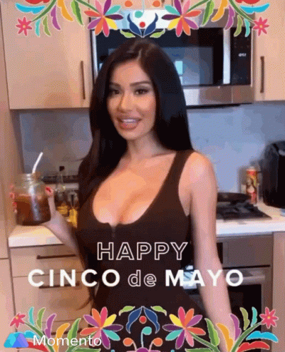 A Woman In A Kitchen With The Words Happy Cinco De Mayo Momento On The Bottom GIF