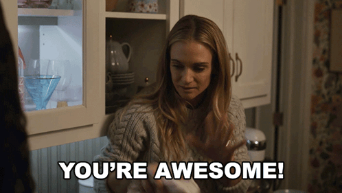 A Woman In A Kitchen With The Words You 'Re Awesome GIF