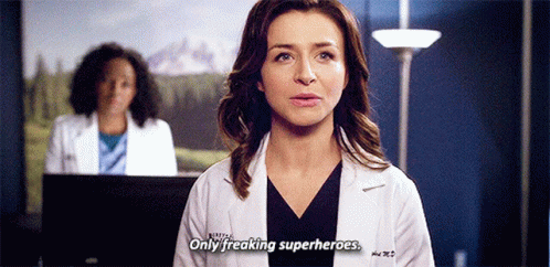 A Woman In A Lab Coat Is Saying Only Freaking Superheroes . GIF