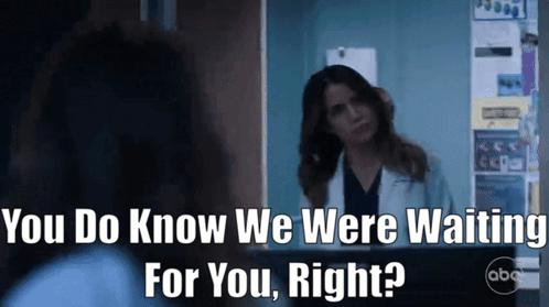 A Woman In A Lab Coat Is Talking To Another Woman And Says " You Do Know We Were Waiting For You Right " . GIF