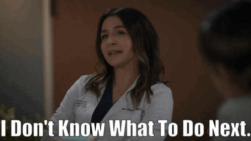 A Woman In A Lab Coat Says I Do N't Know What To Do Next GIF
