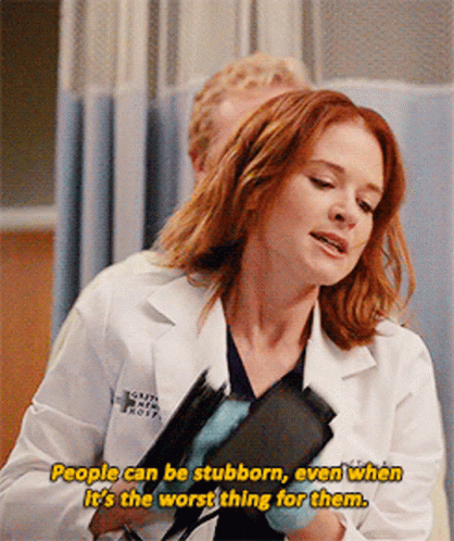 A Woman In A Lab Coat Says People Can Be Stubborn Even When It Is The Worst Thing For Them GIF