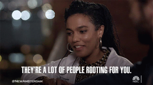 Woman In Lab Coat Saying They're Rooting For You GIF