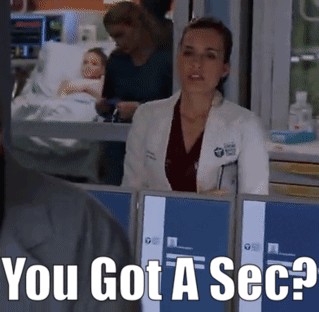 A Woman In A Lab Coat Says " You Got A Sec " In A Hospital Room GIF