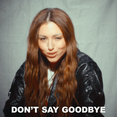 A Woman In A Leather Jacket With The Words " Don 'T Say Goodbye " Below Her GIF