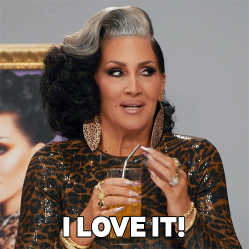 Woman In Leopard Print Dress Drinking Through Straw GIF