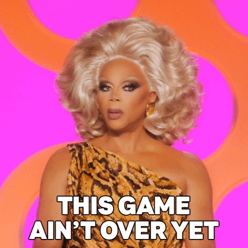A Woman In A Leopard Print Dress Says This Game Ain T Over Yet GIF