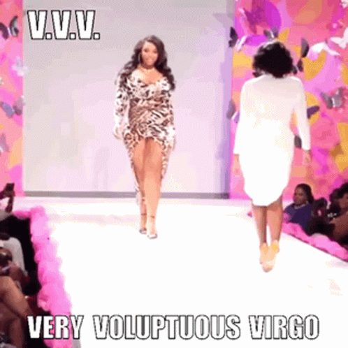 A Woman In A Leopard Print Dress Walks Down A Runway With The Caption " Very Voluptuous Virgo " GIF