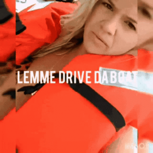 A Woman In A Life Jacket With The Words Lemme Drive Da Boat GIF
