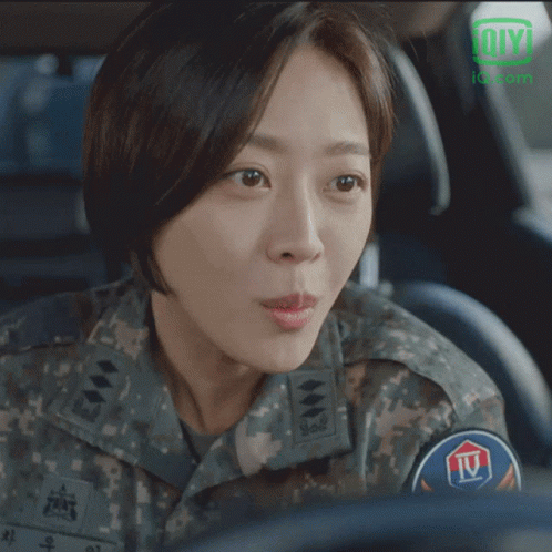Woman In Military Uniform With IV Patch GIF