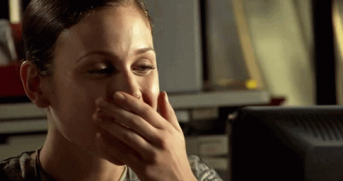 Woman In Military Covering Mouth GIF