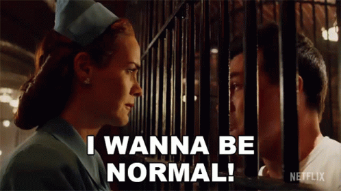 A Woman In A Nurse 'S Hat Says " I Wanna Be Normal " In Front Of A Man Behind Bars GIF
