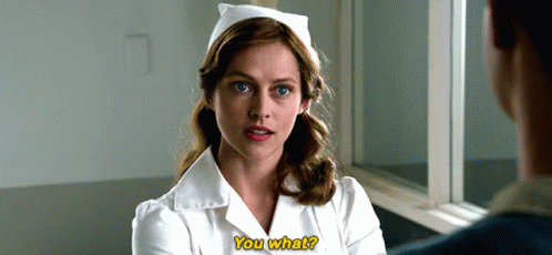 A Woman In A Nurse 'S Uniform Is Talking To A Man And Says " You What " GIF