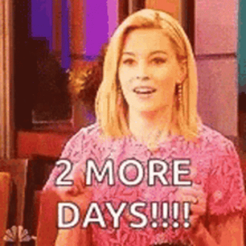 A Woman In A Pink Dress Is Saying `` 2 More Days !! '' GIF