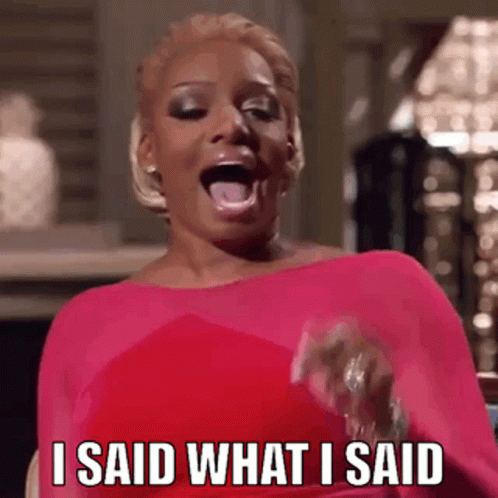 A Woman In A Pink Dress Is Saying I Said What I Said GIF