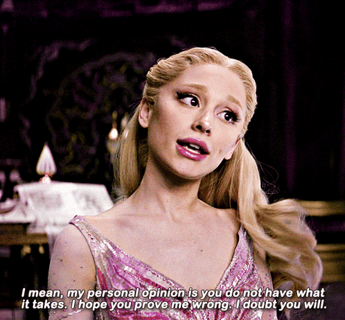 a woman in a pink dress says " i mean my personal opinion is you do not have what it takes
