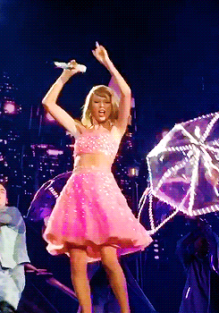 Woman In Pink Dress Singing On Stage GIF