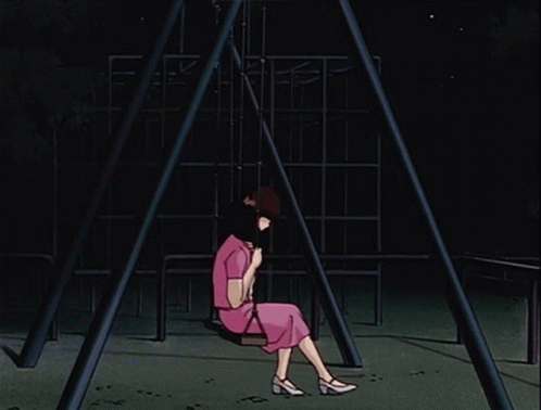 A Woman In A Pink Dress Sits On A Swing In The Dark GIF