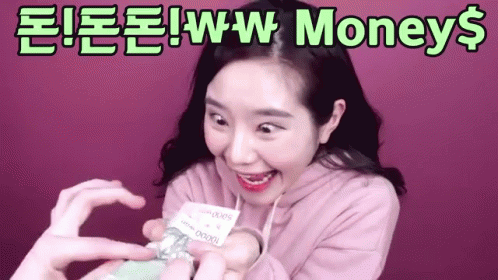 Woman In Pink Hoodie Holding Money GIF