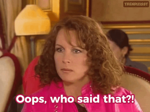 A Woman In A Pink Jacket Says Oops Who Said That ! GIF