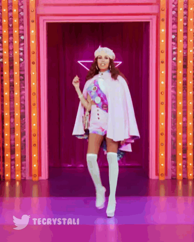 Pink Outfit Woman Dancing In Front Of Twitter Icon GIF
