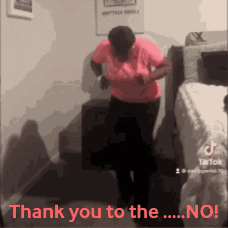 A Woman In A Pink Shirt Is Dancing In A Room With The Words " Thank You To The No " In Red GIF