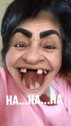 A Woman In A Pink Shirt Is Making A Funny Face With The Words Ha Ha Ha On The Bottom Right GIF